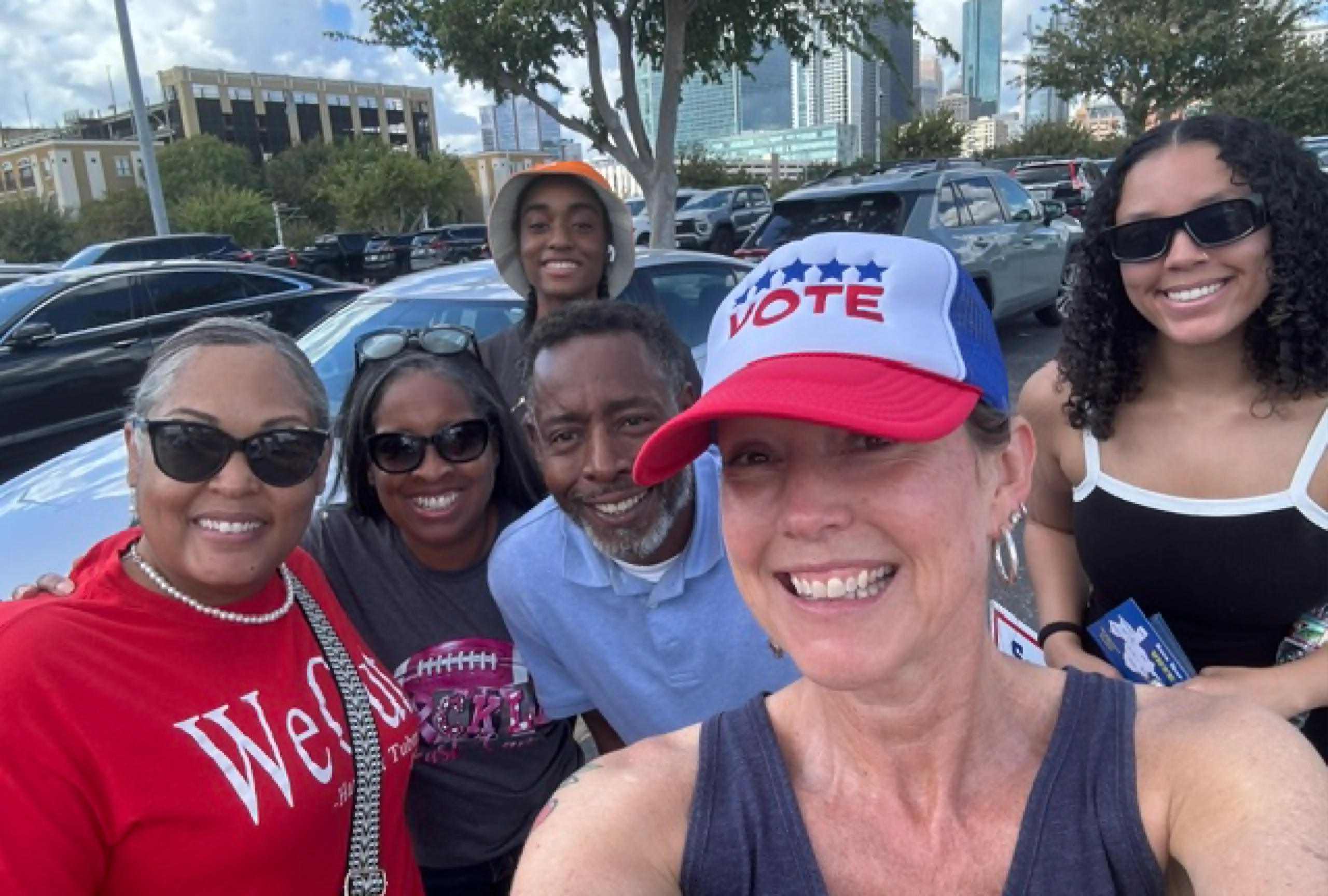 Julie Countiss, candidate for Justice, First Court of Appeals, smiles with supporters at a community